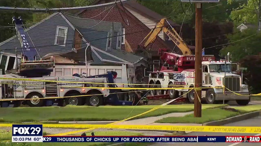 Dump truck plows into NJ home after driver suffers medical emergency