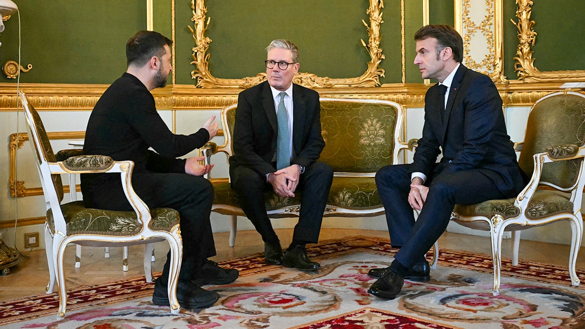 Ukraine's President Volodymyr Zelenskiy, Britain's Prime Minister Keir Starmer and France's President Emmanuel Macron hold a meeting during a summit at Lancaster House in central London, Britain March 2, 2025.