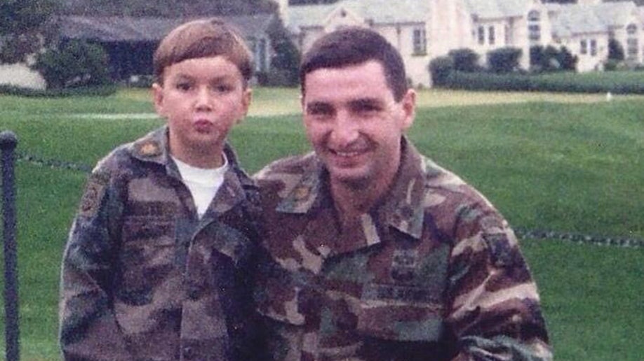 Quets young with his dad