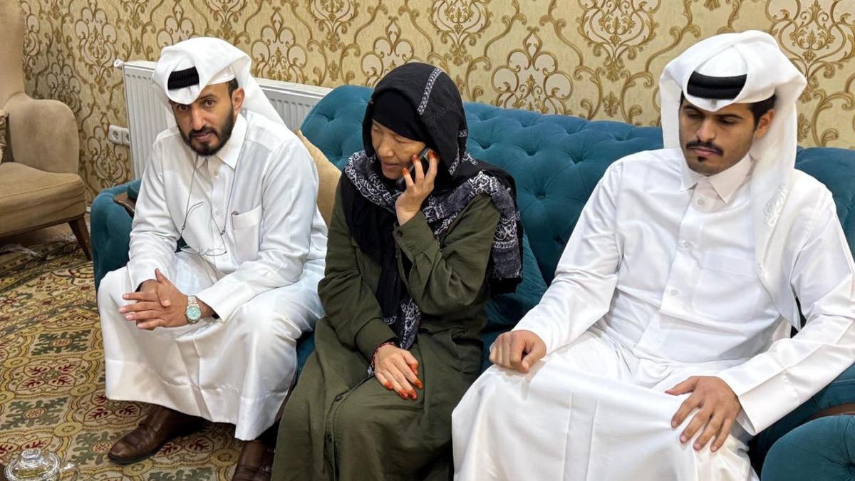 Faye Hall and Qatari officials