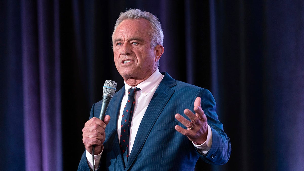 RFK Jr. holding microphone, closeup shot