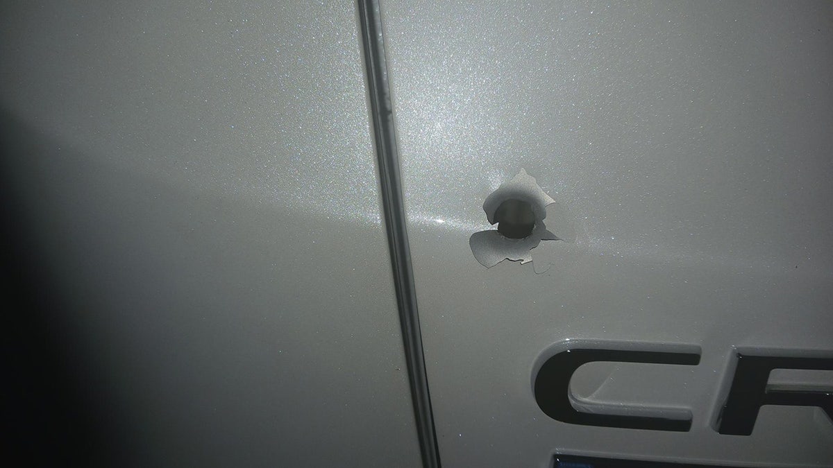Bullet hole in Honda CRV seen after Florida interstate shooting