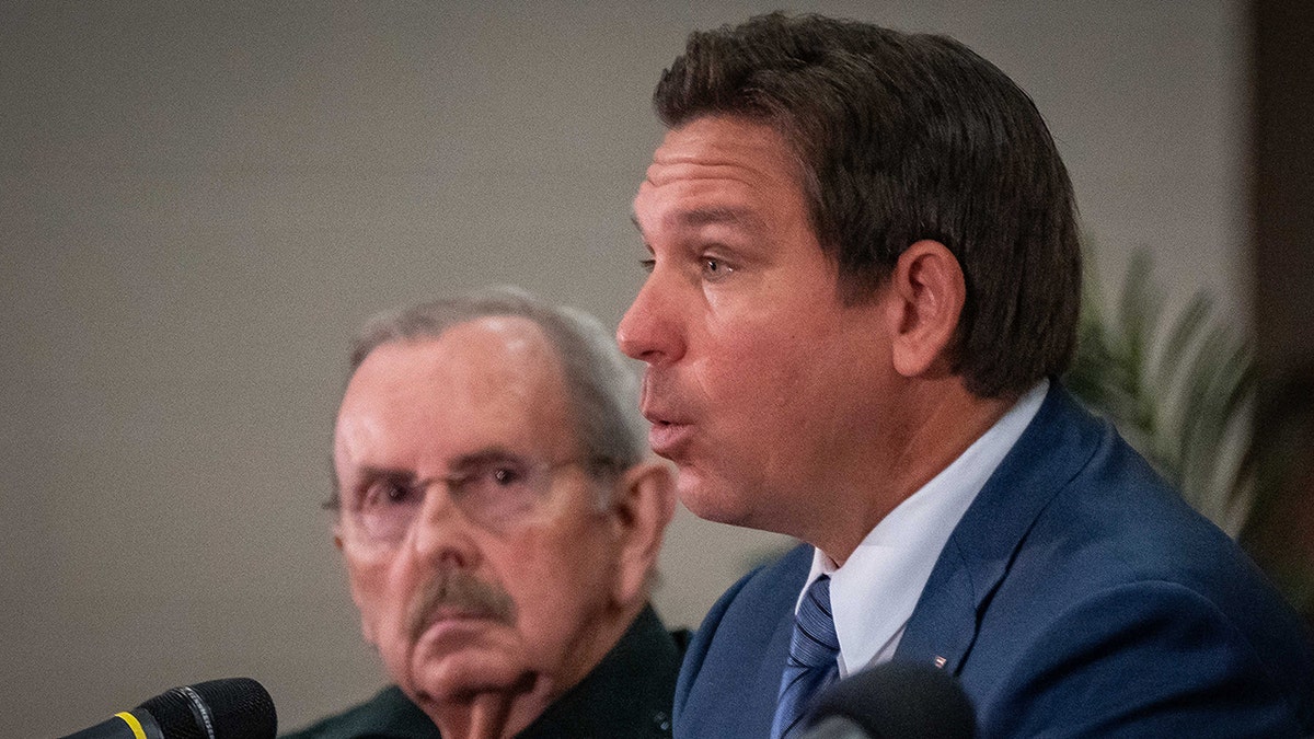 Ron DeSantis and Ric Bradshaw appear at an immigration meeting in Florida