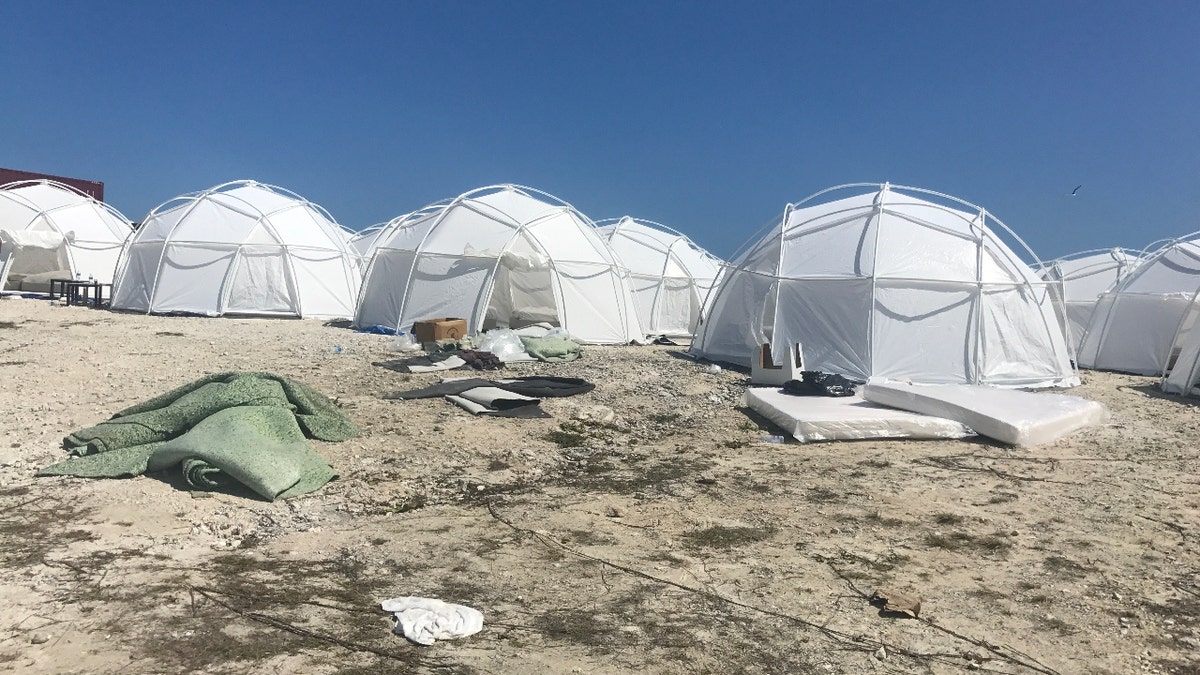 Rows of white, plastic tents on a Bahamas beach seen at Fyre Festival in 2017.