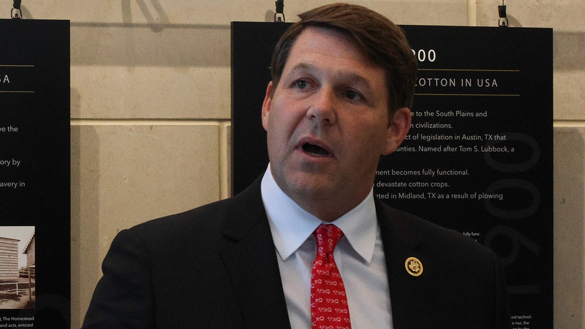 Rep. Jodey Arrington wearing a red tie and speaking