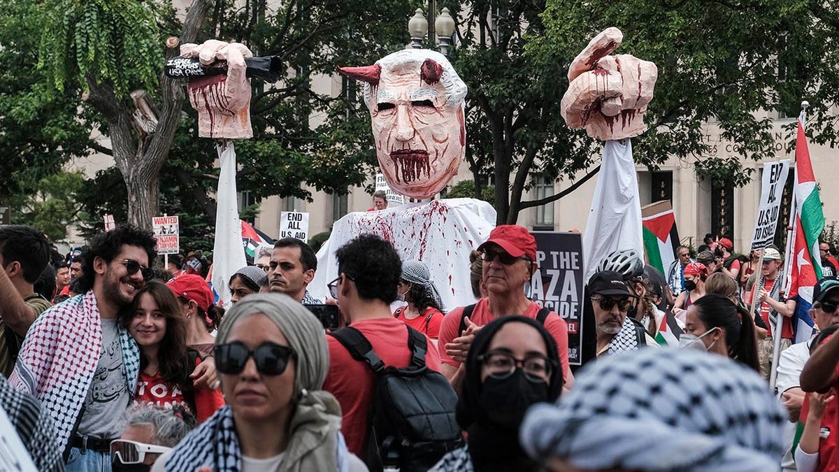 antisemitic puppet display at protest
