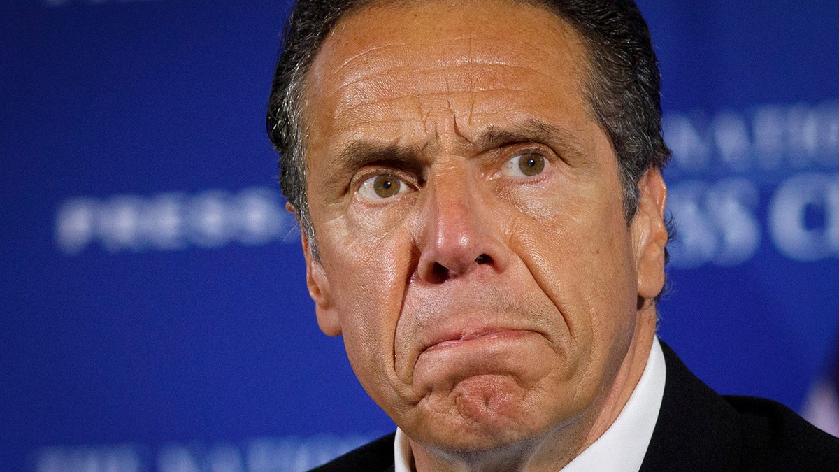 Cuomo scowls at press conference