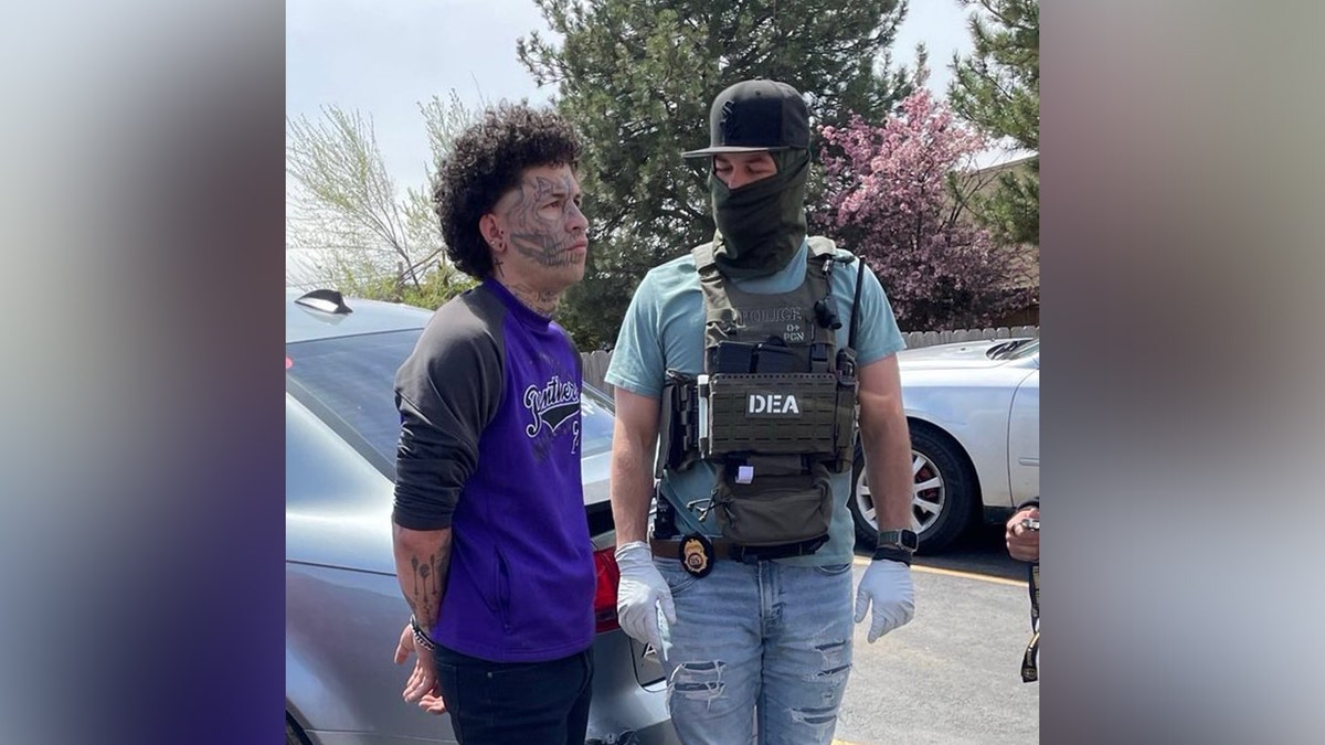 Tren de Aragua member Joel Matos-Nieto and an arresting ICE agent in Denver.