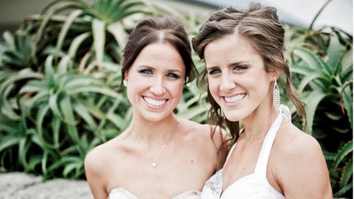 Nicole and Kate Fitzsimons pose for a photo