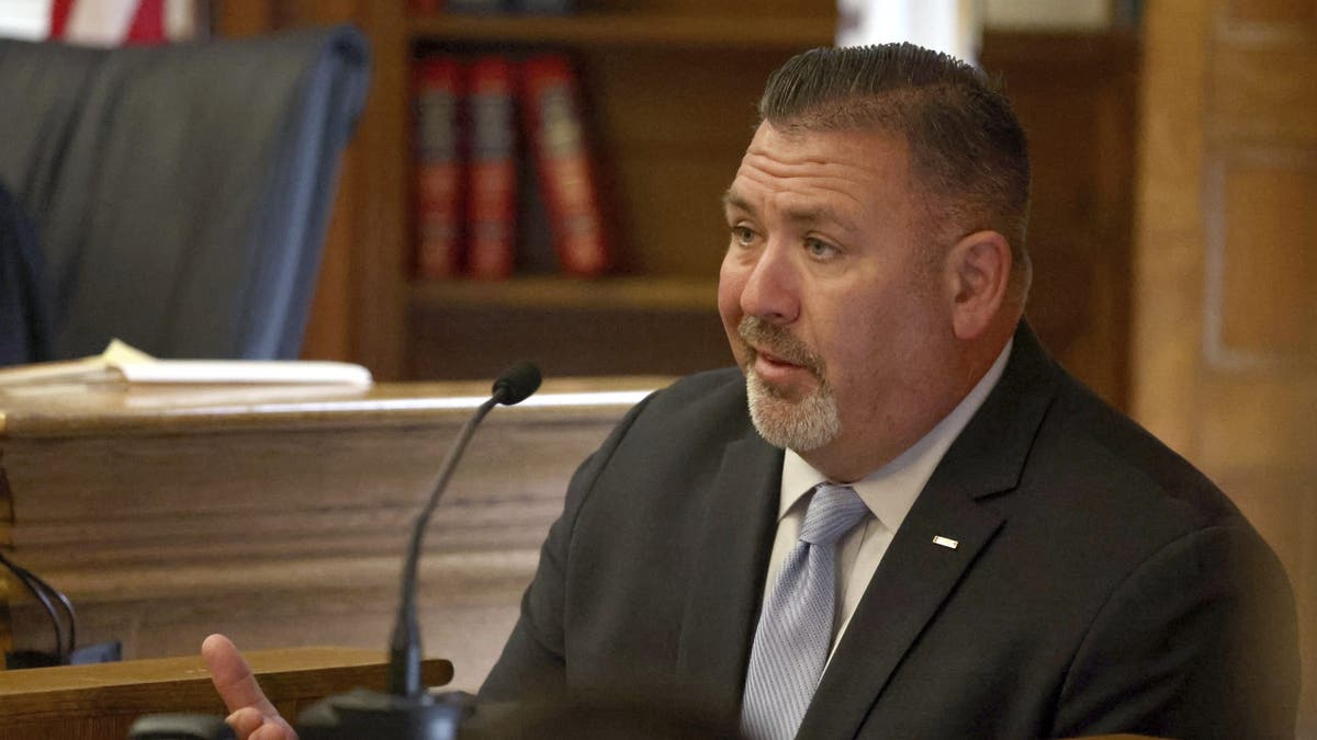 ATF Agent Brian Higgins speaks speaks from the witness stand