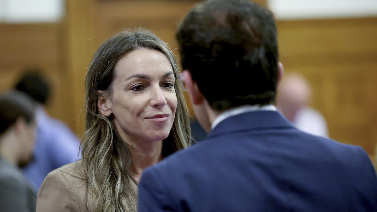 Defendant Karen Read, left, confers with defense lawyer Robert Alessi in court