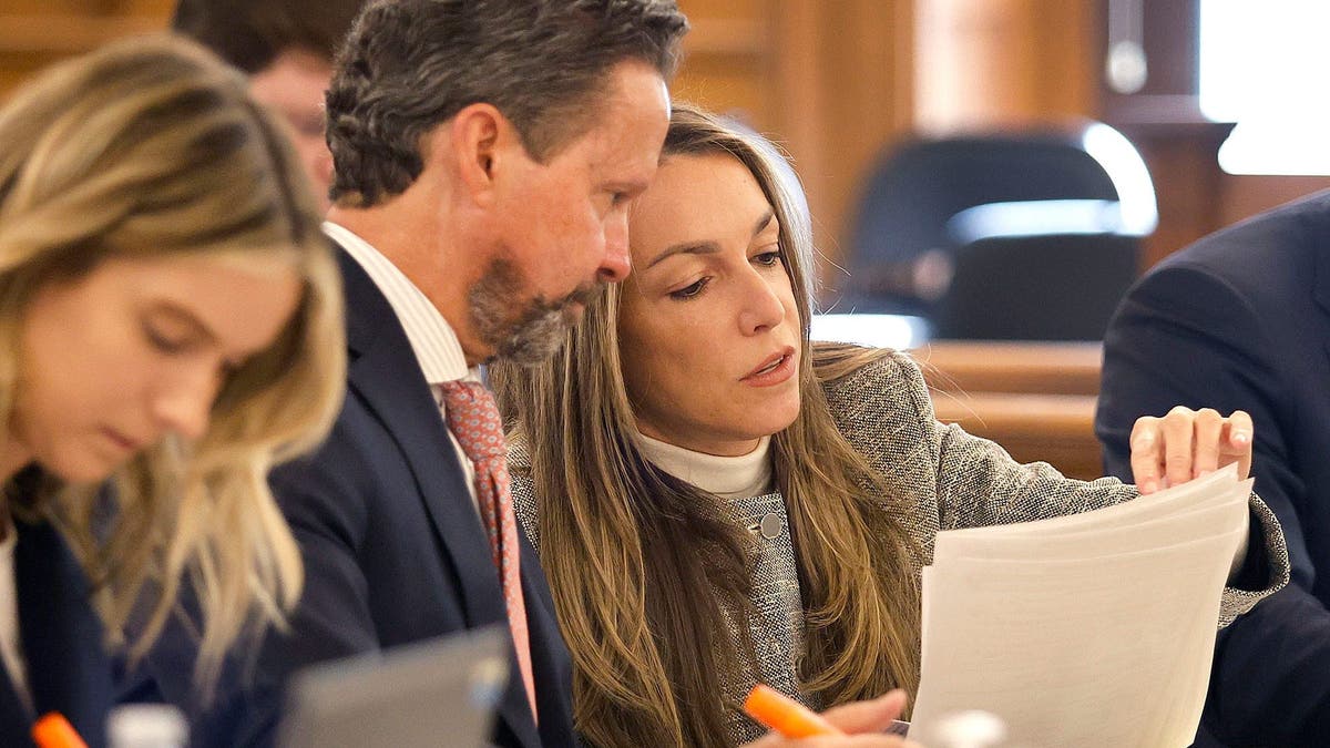 Karen Read and her attorney Alan Jackson review jury questionnaires