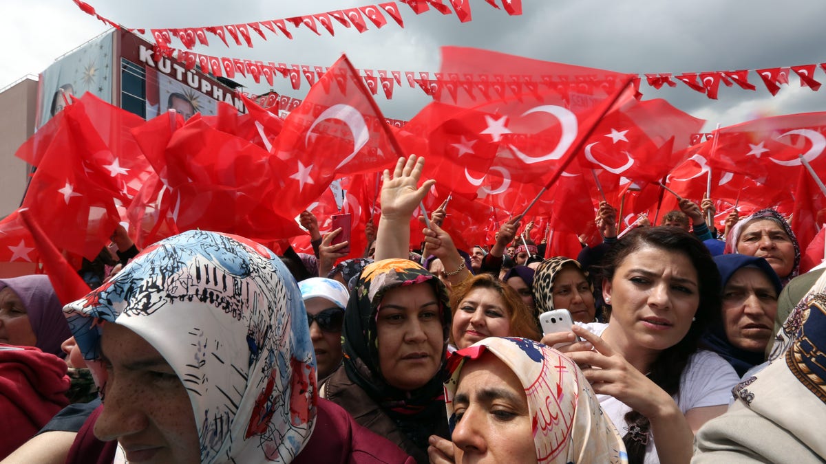 June 5, 2015 - Supporters cheer Turkey's President Recep Tayyip Erdogan at an election rally ahead of Sunday's general election in Ankara, Turkey. A Turkish minister says 2 are dead following 2 explosions at a Kurdish party election rally in southeast Turkey.  