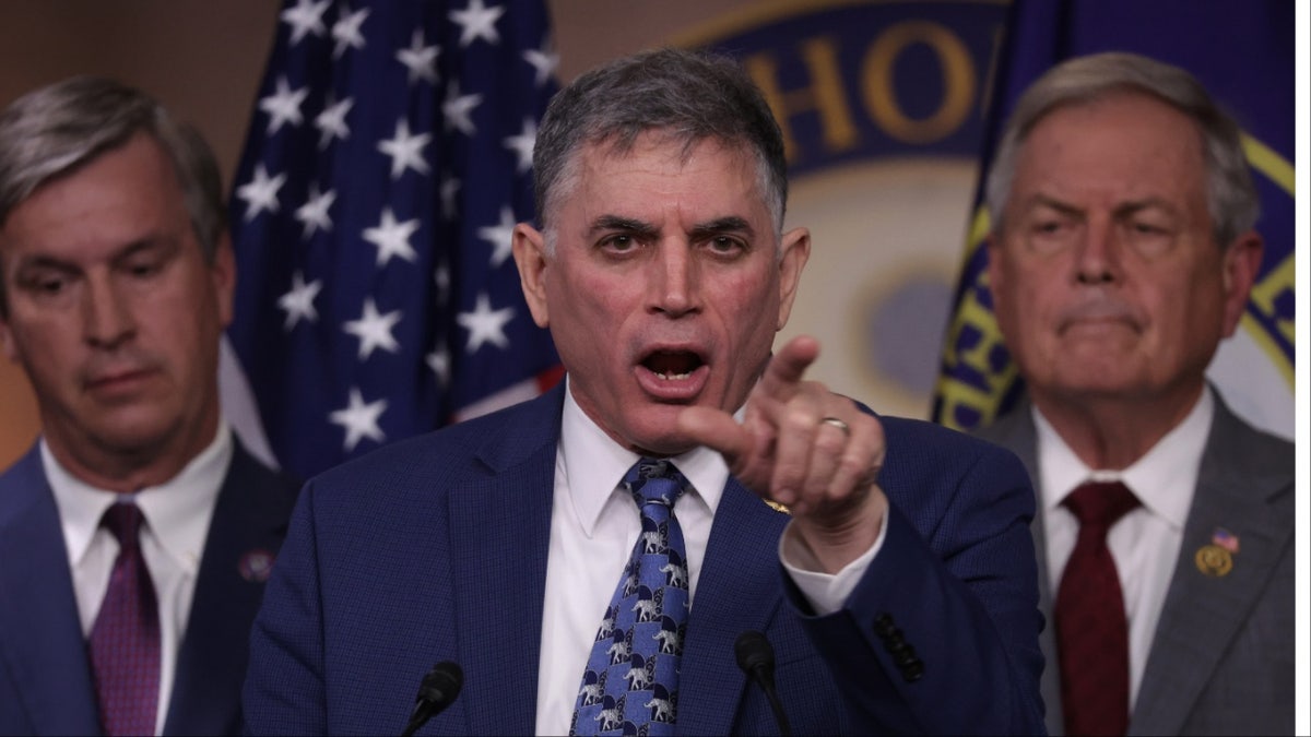 Andrew Clyde speaks at a press conference