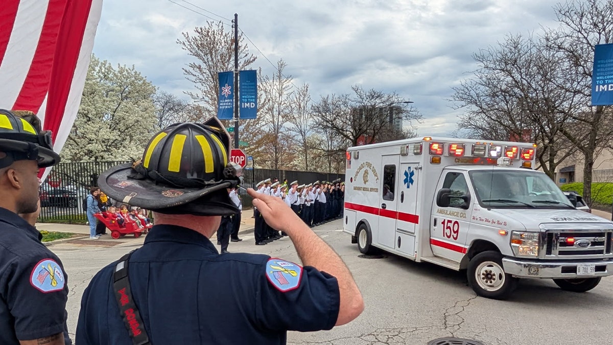 Fallen Chicago firefighter in ambulance