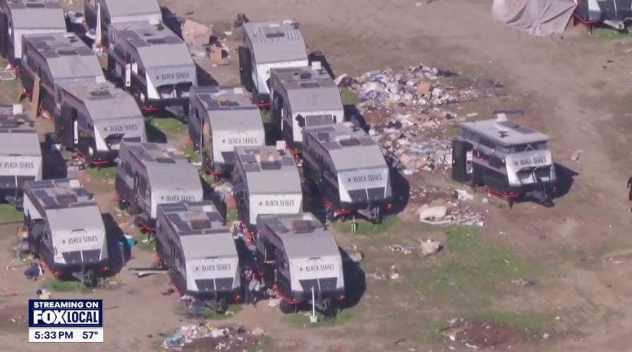 Homeless squatters take over California luxury RV parking lot 