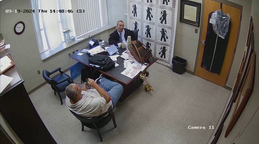 Surveillance footage shows phone exchange between sheriff and judge moments before fatal shooting