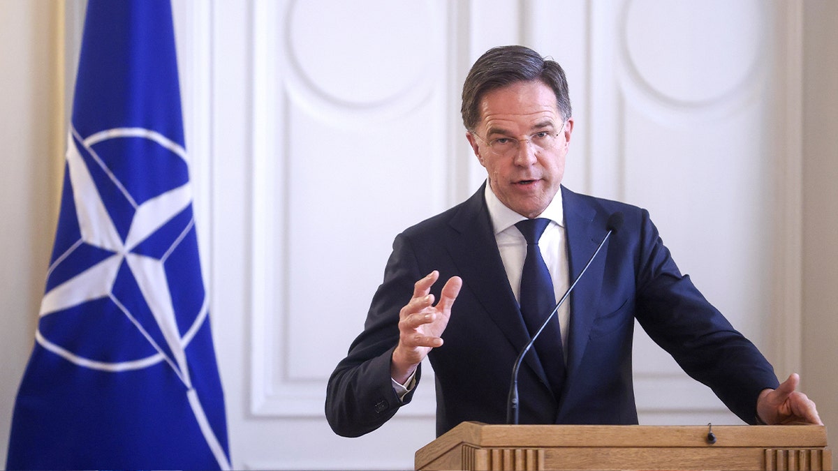 NATO Secretary General Mark Rutte speaking at podium