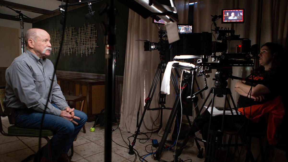 Mike Shannon being interviewed behind the scenes.