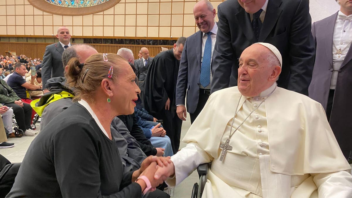 Pope Francis with woman