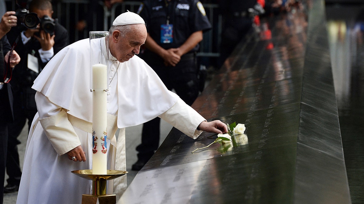 Pope Francis lying flowers down in NYC at the 9/11 Memorial