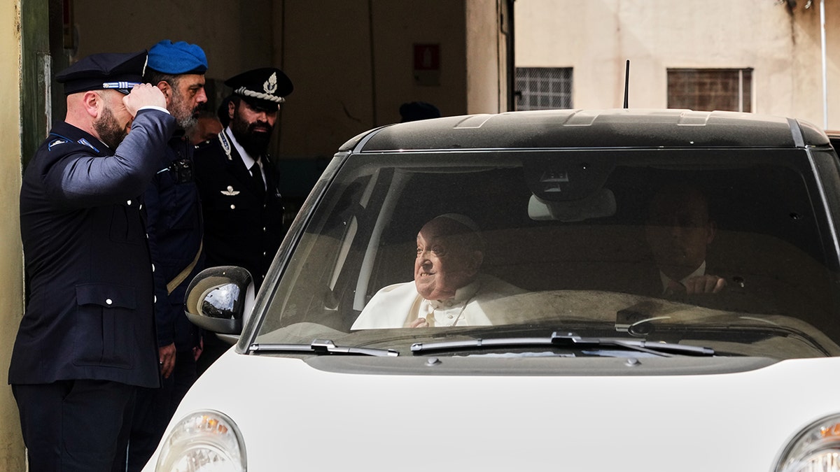 Pope Francis in car at Rome prison on Holy Thursday