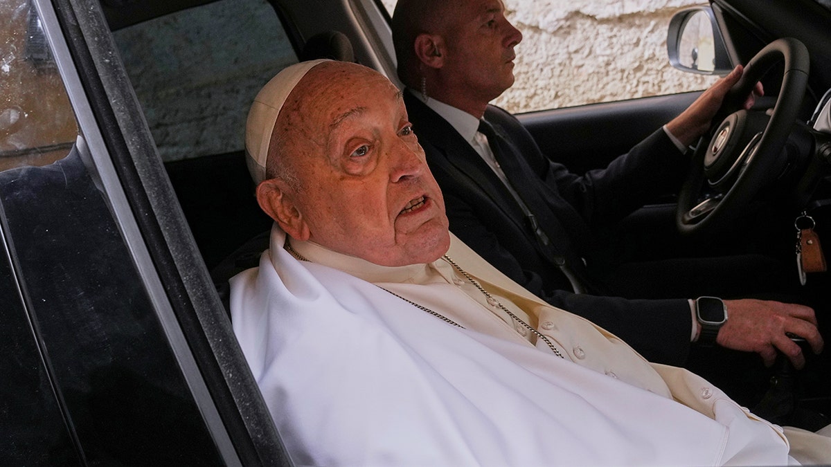 Pope Francis in car at Rome prison