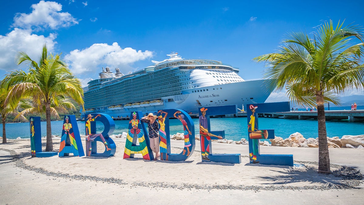 "Labadee" sign in bright letters on the beach of Royal Caribbean's private coastal peninsula