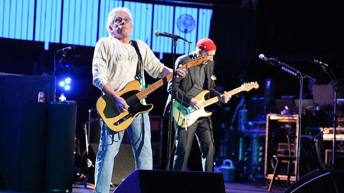 Pete Townshend and Roger Daltrey of the rock band The Who perform on stage during the Teenage Cancer Trust benefit concert at the Royal Albert Hall, London, Thursday, March 27, 2025. 