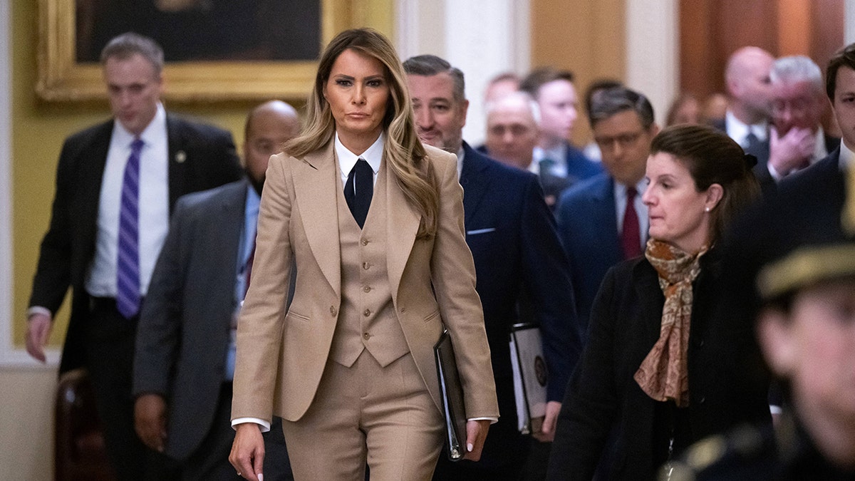 Melania Trump in tan pantsuit walks in Capitol to support TAKE IT DOWN Act