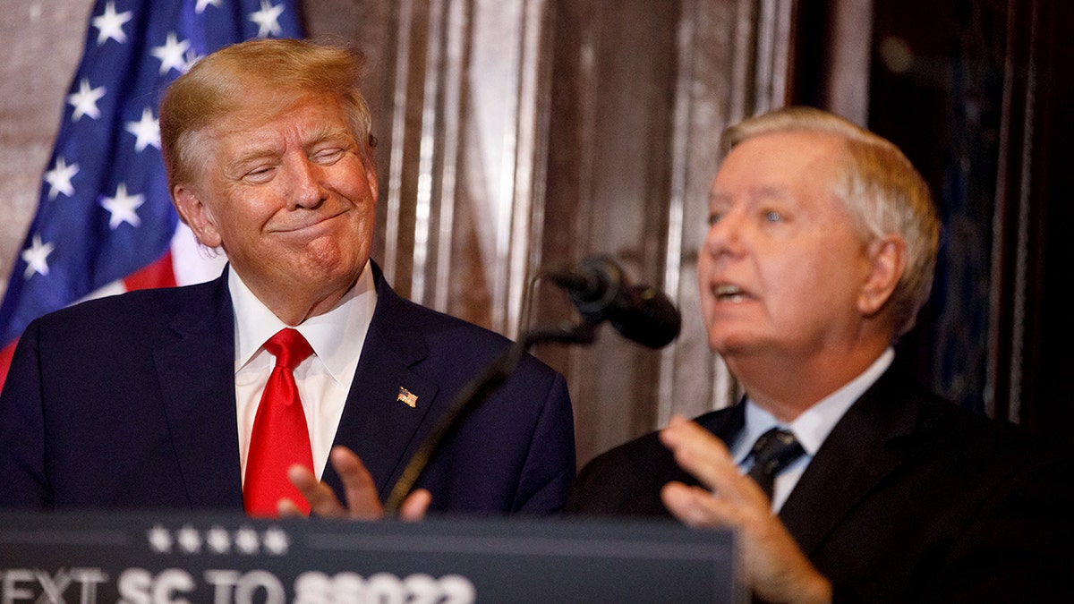 Then-former President Donald Trump and Sen. Lindsey Graham in 2023
