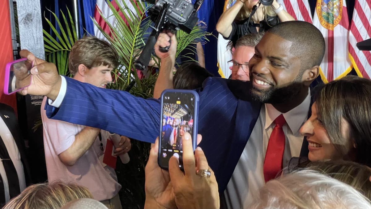 At his campaign kickoff rally, Rep. Byron Donalds takes photos with supporters after delivering an address, on March 28, 2025, in Bonita Springs, Florida.