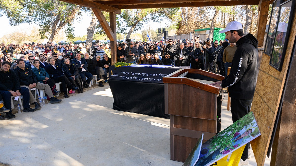 Daniel Lifshitz speaks at his grandfather's funeral