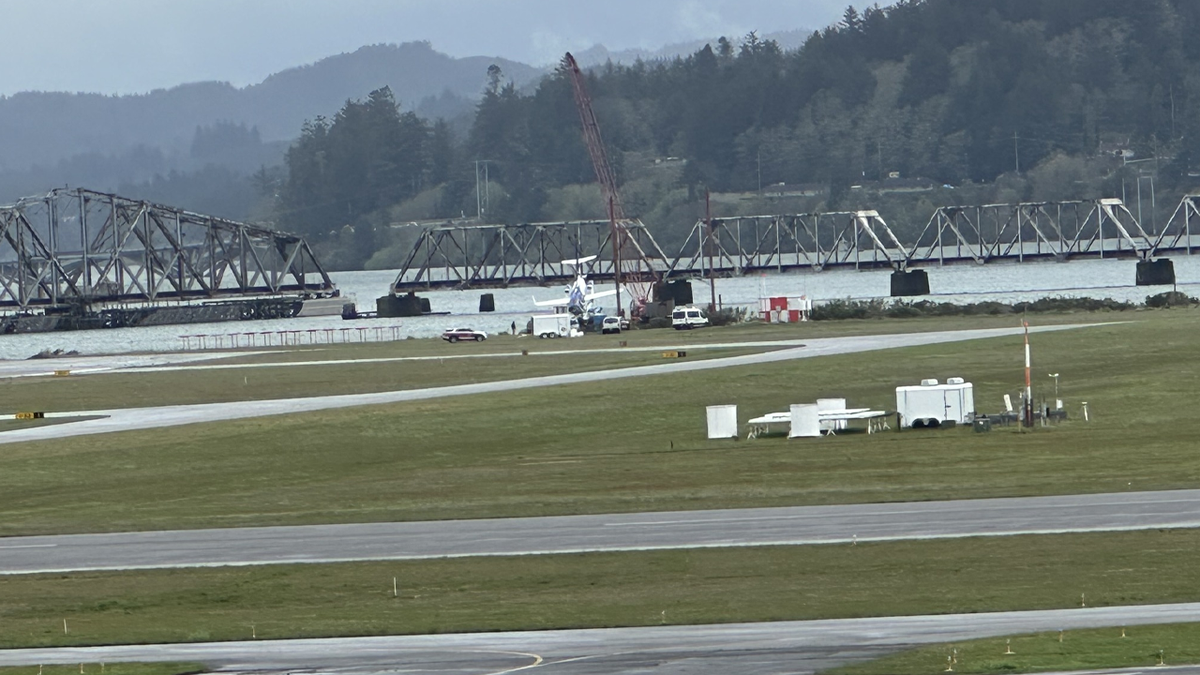 Plane pulled from bay