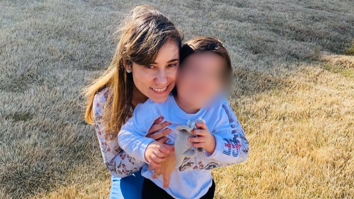 Lina Samarel poses with her son