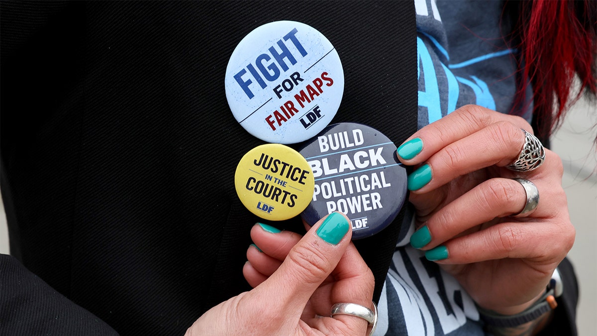 Protest buttons read "Fight for Fair Maps" and "Justice in the Courts" 