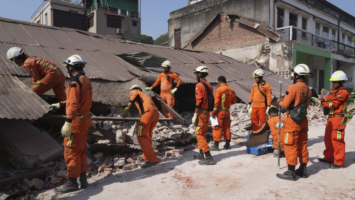 Burma's rescuers work through rubble of a collapsed building following Friday's earthquake in Naypyitaw, Burma, on April 1, 2025.