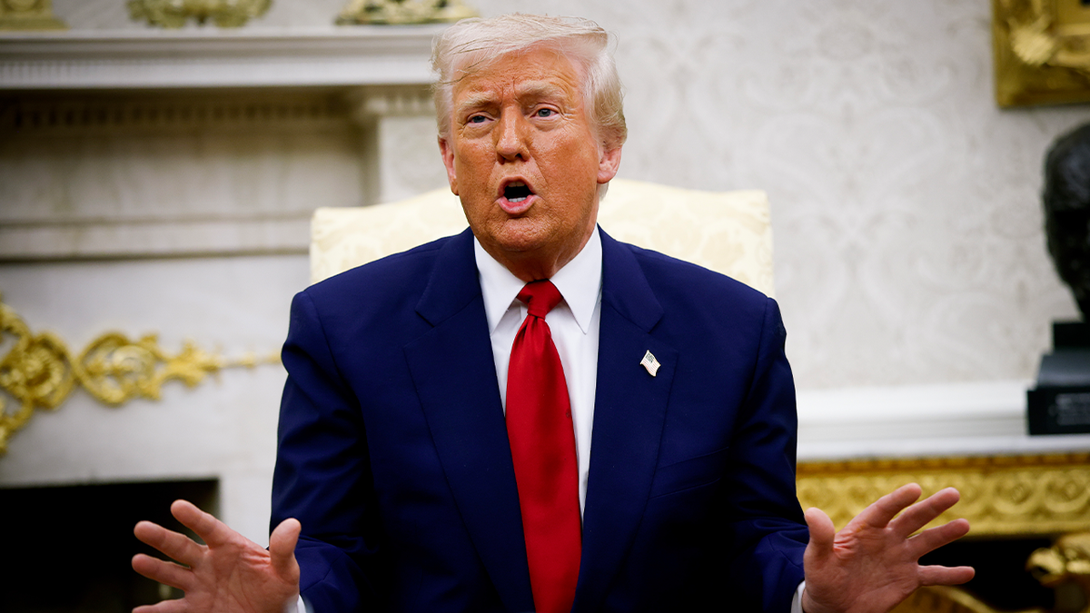 Trump gesturing while he speaks