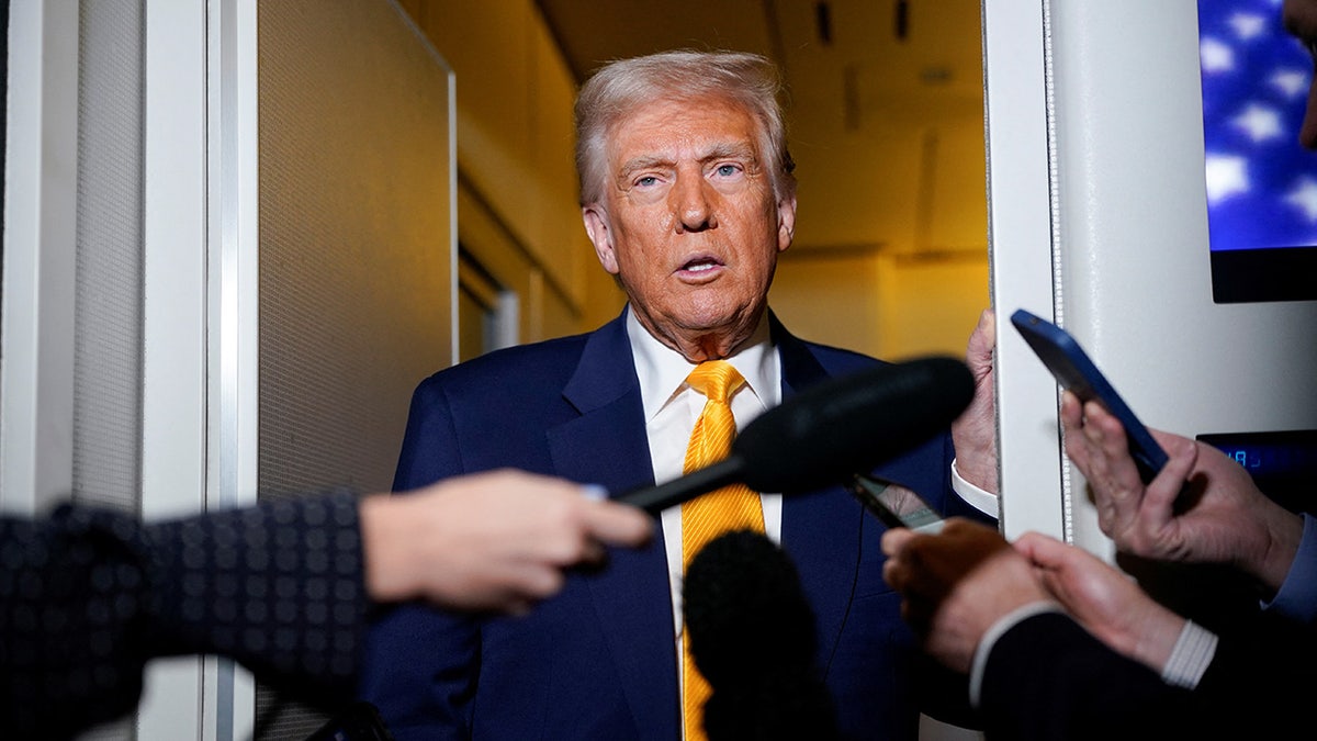 Trump talking to reporters