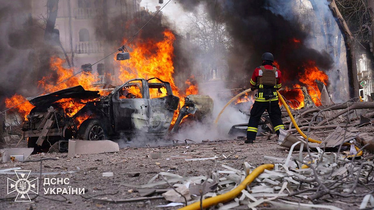 firefighters put out a vehicle fire