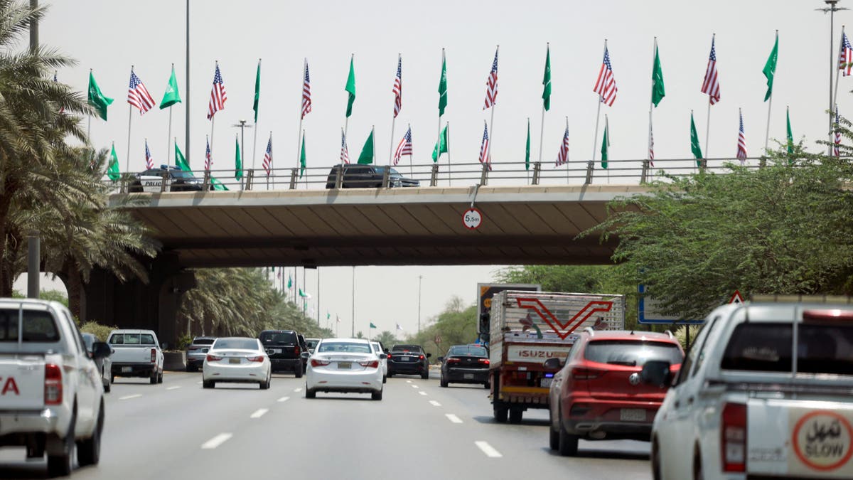 flags on overpass in Riyadh