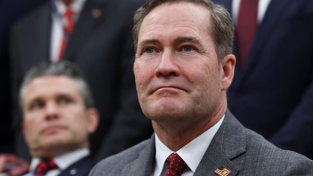 National Security Advisor Mike Waltz pictured next to Defense Sec. Pete Hegseth 