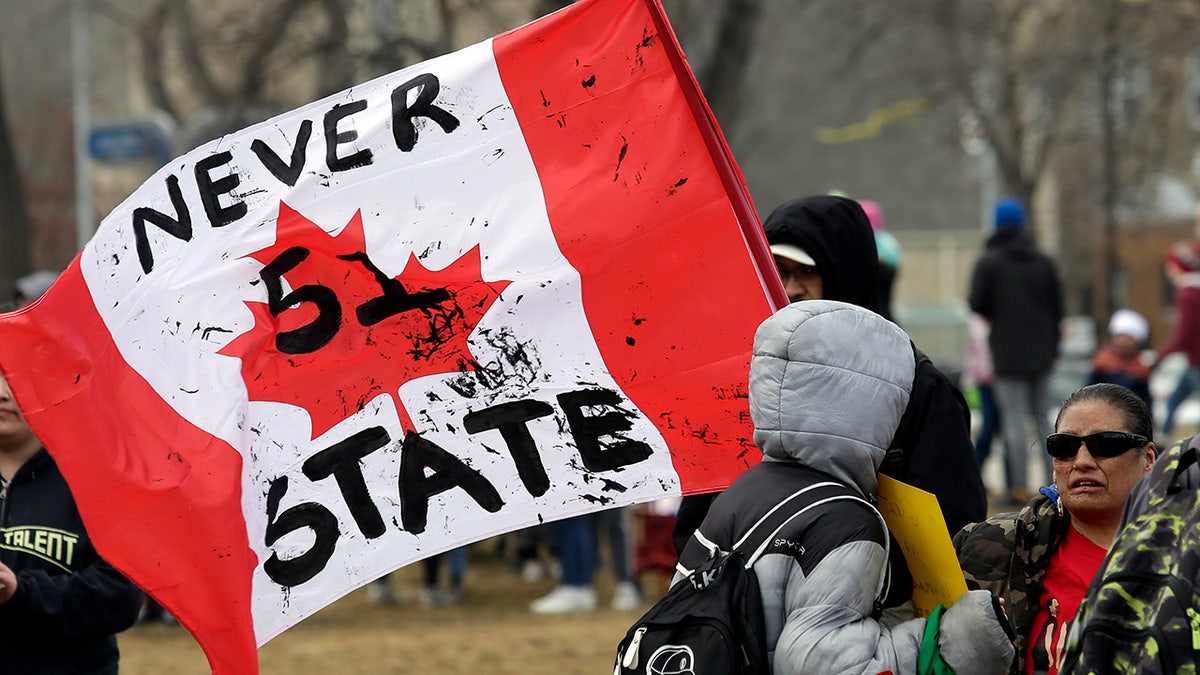 Hundreds of people rally against U.S. tarrifs and threats of annexation at the Manitoba Legislature. Hundreds gathered at the Manitoba Legislature for a "Rally for Canada," showing national pride and protesting U.S. tariffs and annexation threats. The event featured ball hockey, burgers, and music, with attendees dressed in red and white to affirm Canada’s sovereignty.