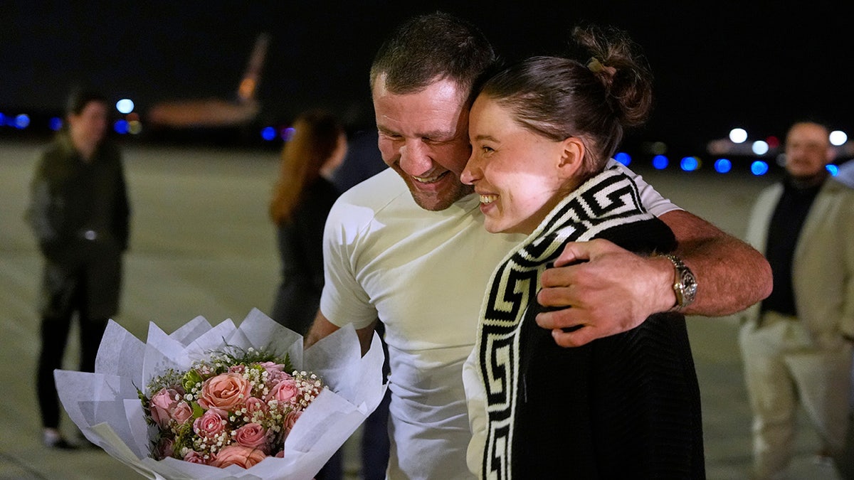 Ksenia Karelina arrives back in U.S.