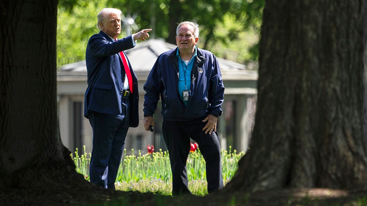 President Donald Trump and Dale Haney, head White House groundskeeper, on North Lawn 