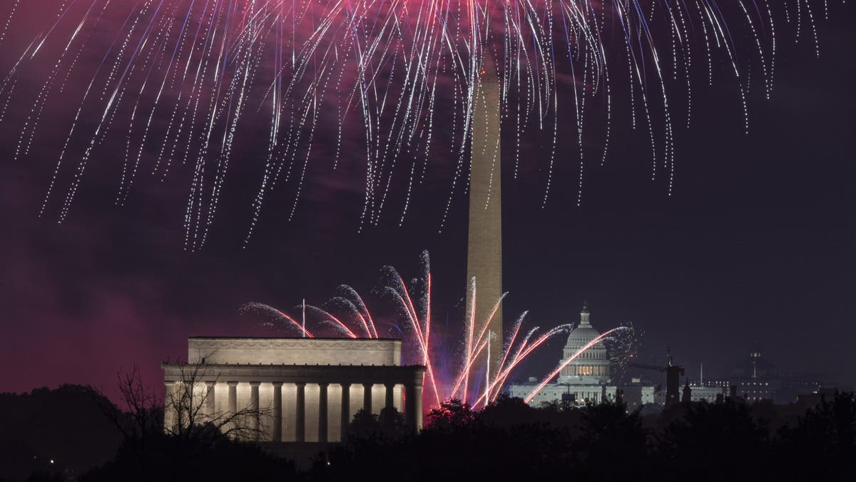 fireworks in DC with monuments lit up