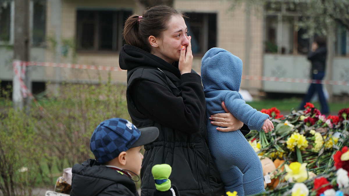 woman at Ukraine memorial 