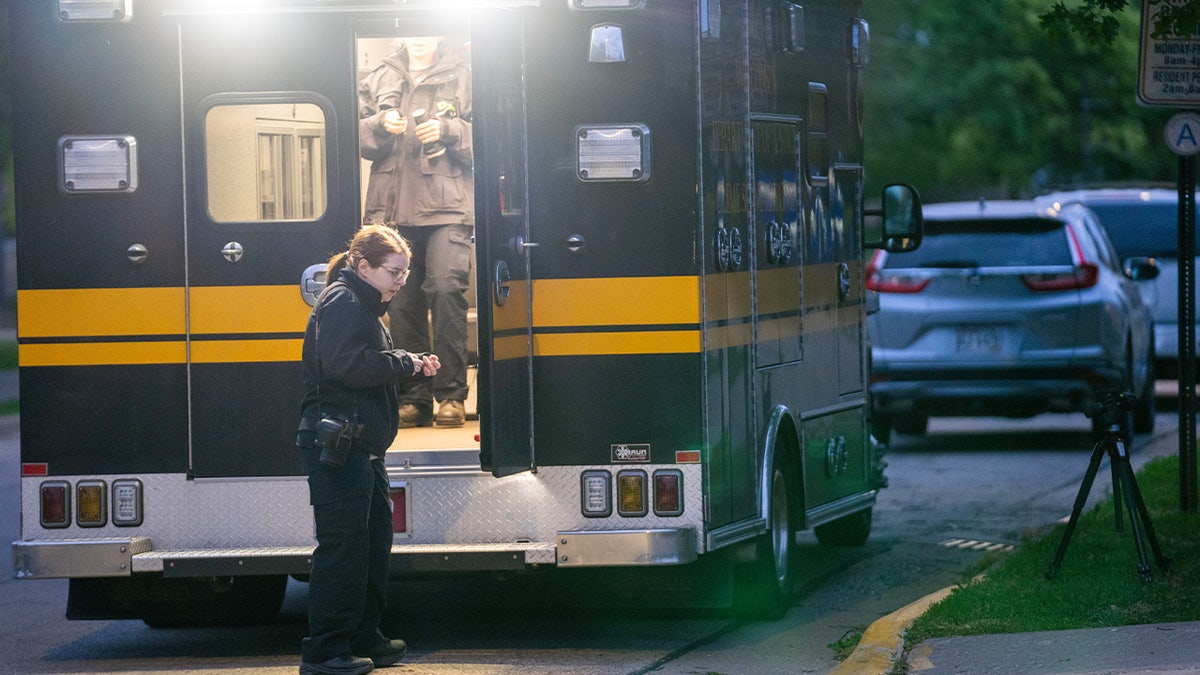Personnel from the Wisconsin State Crime Lab are shown at Wilgus Hall 