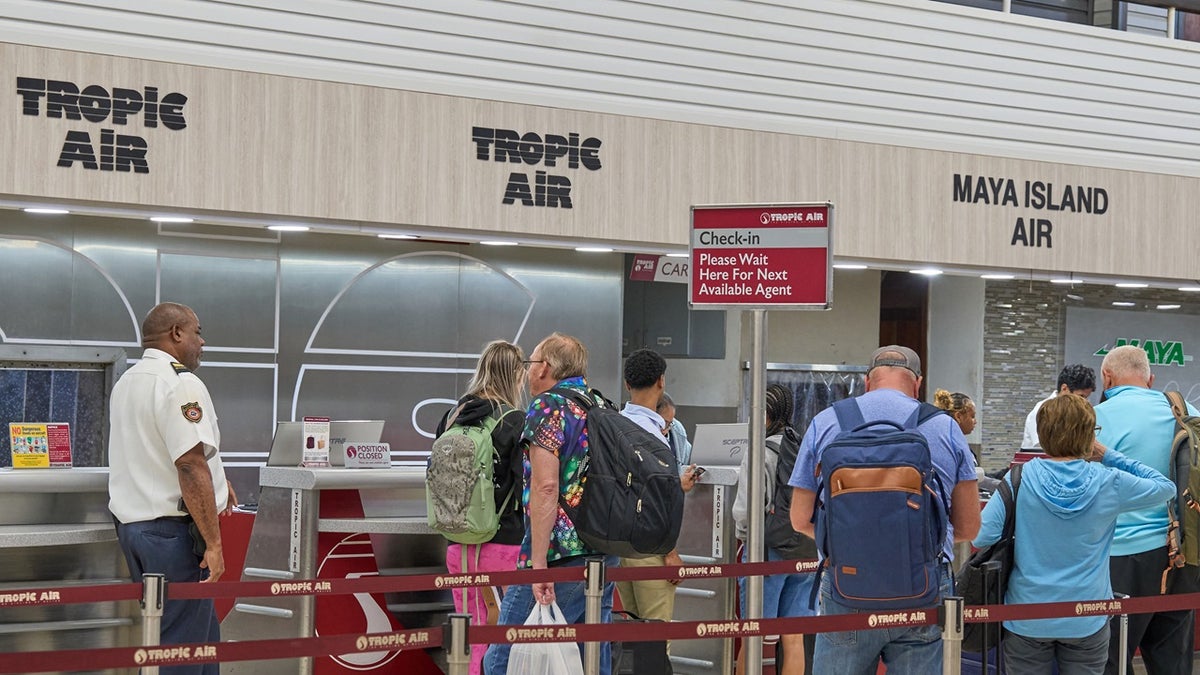 passengers at Philip S.W. Goldson International Airport