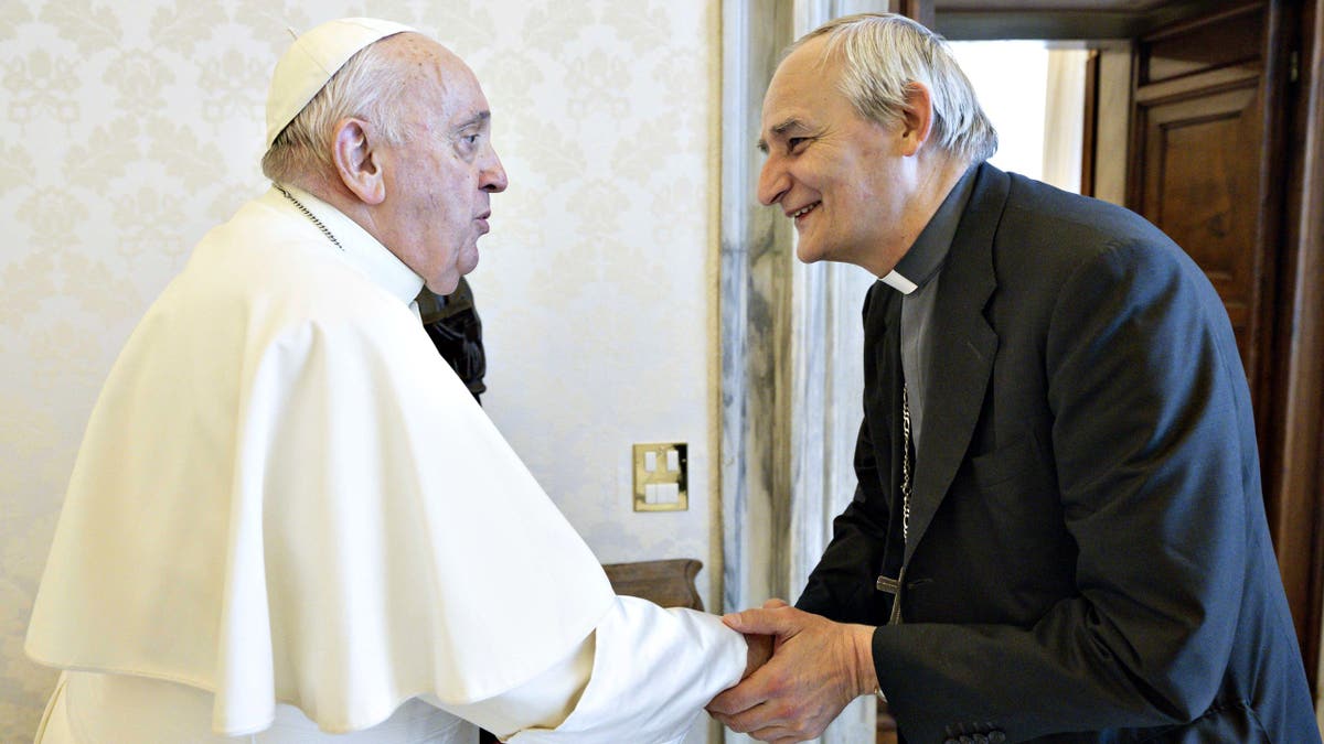 Cardinal Matteo Zuppi and Pope Francis